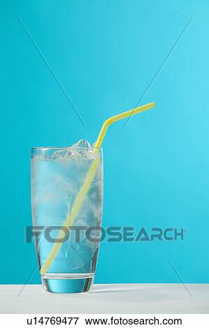 Clear glass of water with yellow drinking straw View Large Photo Image Stock Photo - Clear glass of water with yellow drinking straw. Fotosearch