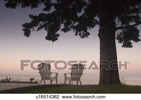 Stock Image - Cottage chair at Lake Manitoba, Canada. Fotosearch