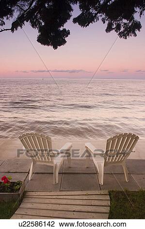 Cottage chair at Lake Manitoba, Canada View Large Photo Image Stock Image - Cottage chair at Lake Manitoba, Canada. Fotosearch