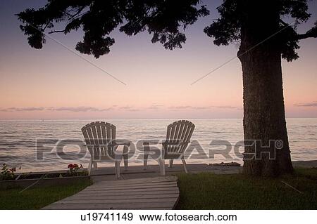 Cottage chair at Lake Manitoba, Canada View Large Photo Image Stock Photo - Cottage chair at Lake Manitoba, Canada. Fotosearch