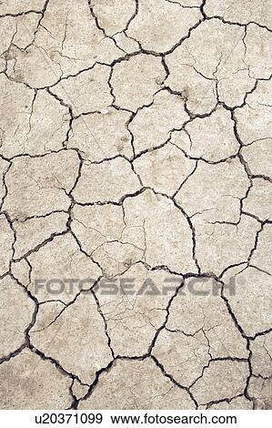 Stock Photo - Cracked earth near Leader, Saskatchewan, Canada. Fotosearch