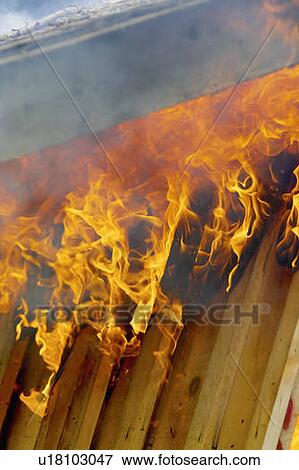 Flames and smoke burn up roof of shed, Hamilton, Ontario View Large Photo Image Stock Photo - Flames and smoke burn up roof of shed, Hamilton, Ontario. Fotosearch