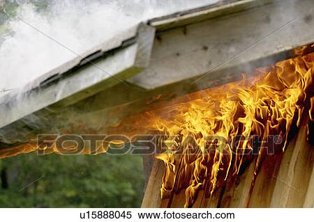 Flames and smoke burn up roof of shed, Hamilton, Ontario View Large Photo Image Stock Photography - Flames and smoke burn up roof of shed, Hamilton, Ontario. Fotosearch