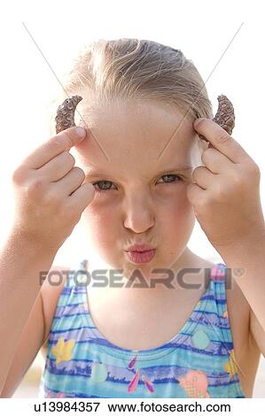 Stock Photo - Girl - 5 years old at the Lake Winnipeg, Canada. Fotosearch