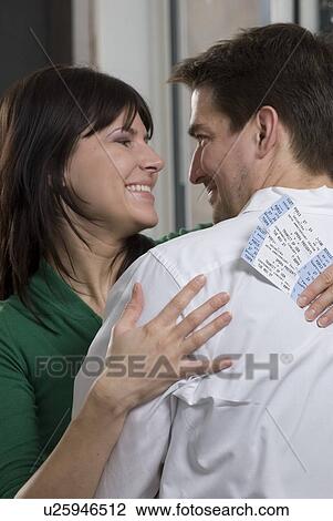 Stock Image - Green gift giving can include giving event tickets instead of material goods, Winnipeg, Canada. Fotosearch