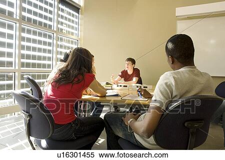 Group of students in round table discussion, in front of solar panelled windows, Winnipeg, Canada View Large Photo Image Stock Photography - Group of students in round table discussion, in front of solar panelled windows, Winnipeg, Canada. Fotosearch
