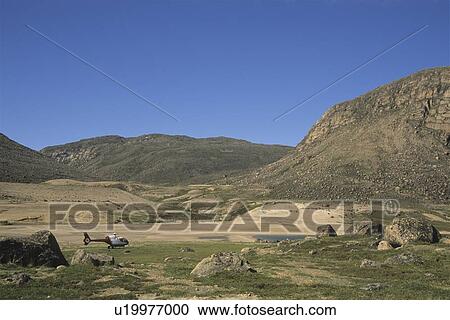 Helicopter rests near Qaungnat Lake, Ukkusiksalik National Park, Wager Bay, Nunavut, Canada View Large Photo Image Stock Image - Helicopter rests near Qaungnat Lake, Ukkusiksalik National Park, Wager Bay, Nunavut, Canada. Fotosearch