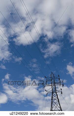 Stock Image - High-Voltage Power lines on a cloudy day, Victoria, BC. Fotosearch
