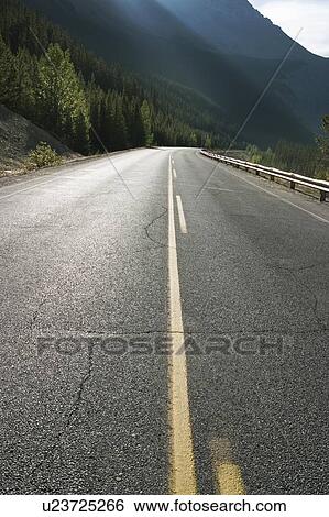 Stock Photograph - Highway in the Canadian Rockies.. Fotosearch