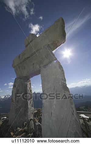 Inukshuk statue at the Peak on Whistler Mountain, Whistler, BC, Canada View Large Photo Image Stock Image - Inukshuk statue at the Peak on Whistler Mountain, Whistler, BC, Canada. Fotosearch