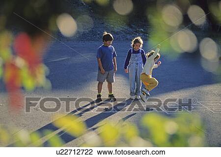 Kids playing hopscotch in autumn, Whistler, BC Canada View Large Photo Image Stock Image - Kids playing hopscotch in autumn, Whistler, BC Canada. Fotosearch