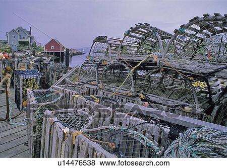 Stock Photo - Lobster traps near Peggy's Cove, Nova Scotia Canada. Fotosearch