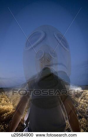 Multiple exposures of person wearing gas mask at night View Large Photo Image Stock Image - Multiple exposures of person wearing gas mask at night. Fotosearch