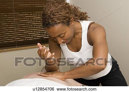 Person receiving massage therapy, British Columbia, Canada View Large Photo Image Stock Photograph - Person receiving massage therapy, British Columbia, Canada. Fotosearch