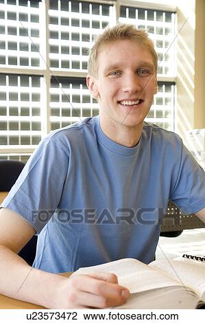 Portrait of male student in front of solar panelled windows, Winnipeg, Canada. View Large Photo Image Stock Image - Portrait of male student in front of solar panelled windows, Winnipeg, Canada.. Fotosearch