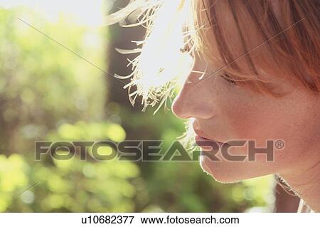 Profile of a woman outdoors, Riding Mountain National Park, Manitoba, Canada View Large Photo Image Stock Photo - Profile of a woman outdoors, Riding Mountain National Park, Manitoba, Canada. Fotosearch