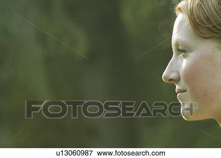 Profile of woman's face, Grayling Lake, Riding Mountain National Park, Manitoba, Canada View Large Photo Image Stock Photo - Profile of woman's face, Grayling Lake, Riding Mountain National Park, Manitoba, Canada. Fotosearch