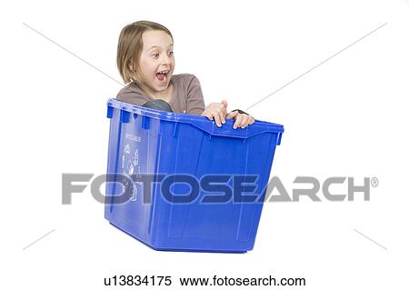 Stock Photography - recycling box with the girl inside. Fotosearch