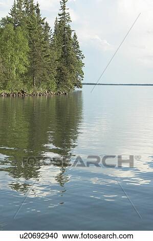 Reflection in Clear Lake, Riding Mountain National Park, Manitoba, Canada View Large Photo Image Stock Image - Reflection in Clear Lake, Riding Mountain National Park, Manitoba, Canada. Fotosearch