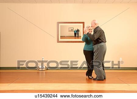 Senior Couple Dancing; Canada, Saskatchewan, Regina View Large Photo Image Picture - Senior Couple Dancing; Canada, Saskatchewan, Regina. Fotosearch