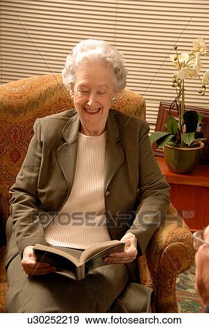 Senior Woman in Armchair; Canada, Saskatchewan, Regina View Large Photo Image Stock Photo - Senior Woman in Armchair; Canada, Saskatchewan, Regina. Fotosearch