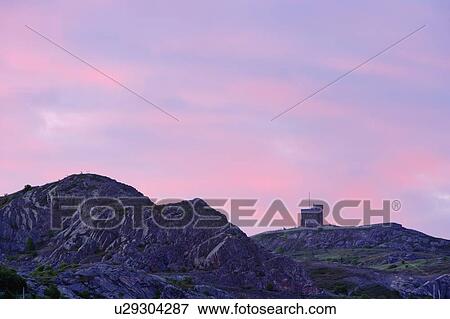 Stock Photo - Signal Hill National Historic Site. View of Cabot Tower at dawn, St. John's, Newfoundland, Canada. Fotosearch
