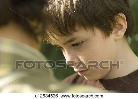 Six year old boy looking intent, Winnipeg, Canada View Large Photo Image Stock Photograph - Six year old boy looking intent, Winnipeg, Canada. Fotosearch