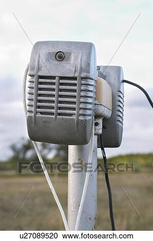 Stock Image - Speakers at a Drive-In, Saskatchewan. Fotosearch