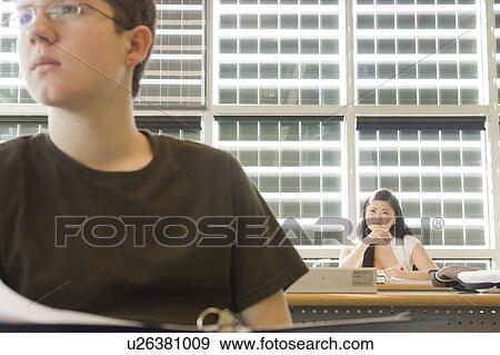 Stock Photo - Students listening to lecture in classroom in front of Solar panels, Winnipeg, Canada. Fotosearch