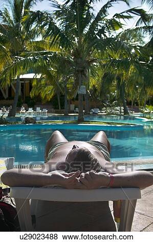 Stock Photo - Sunbathing in a Varadero resort, Cuba. Fotosearch