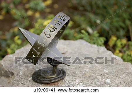Sundial on rock, Burlington, Ontario. View Large Photo Image Stock Image - Sundial on rock, Burlington, Ontario.. Fotosearch