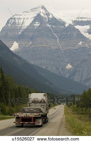 Traffic on a highway through the mountains, Mount Robson, Mount Robson Provincial Park, BC, Canada View Large Photo Image Stock Photo - Traffic on a highway through the mountains, Mount Robson, Mount Robson Provincial Park, BC, Canada. Fotosearch