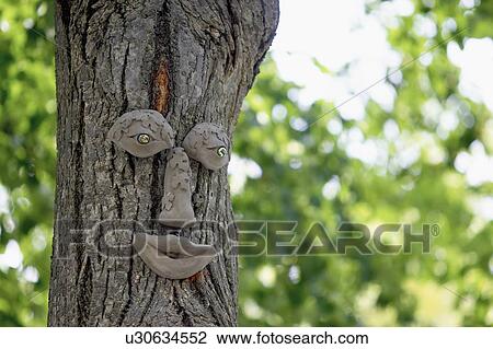 Tree trunk with eyes, nose, and mouth, Burlington, Ontario. View Large Photo Image Stock Image - Tree trunk with eyes, nose, and mouth, Burlington, Ontario.. Fotosearch