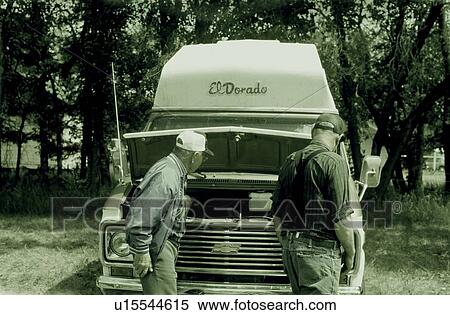 Two senior rural men checking out used van at auction sale, Saskatchewan, Canada View Large Photo Image Stock Photography - Two senior rural men checking out used van at auction sale, Saskatchewan, Canada. Fotosearch