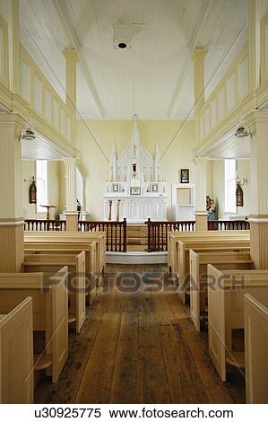 Stock Photography - View of inside of Holy Trinity Roman Catholic Church, Trinity, Newfoundland, Canada. Fotosearch