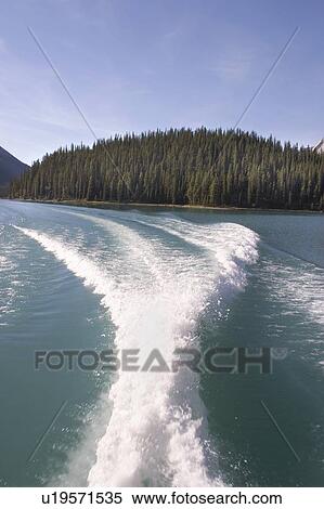 Wake of a boat in Maligne Lake, Jasper National Park, Alberta View Large Photo Image Stock Photography - Wake of a boat in Maligne Lake, Jasper National Park, Alberta. Fotosearch