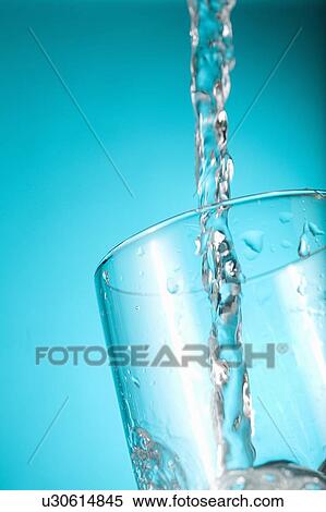 Water pouring into clear glass View Large Photo Image Stock Photography - Water pouring into clear glass. Fotosearch