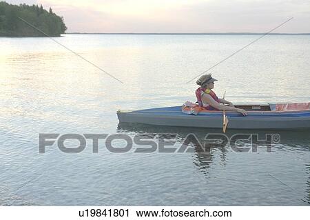 Woman in kayak Clear Lake Riding Mt. Nat. Park; Canada, Manitoba, Riding Mountain National Park View Large Photo Image Stock Image - Woman in kayak Clear Lake Riding Mt. Nat. Park; Canada, Manitoba, Riding Mountain National Park. Fotosearch
