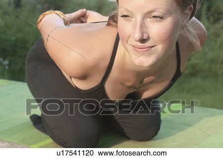 Woman in yoga pose, beside Grayling Lake, Riding Mountain National Park, Manitoba, Canada View Large Photo Image Stock Image - Woman in yoga pose, beside Grayling Lake, Riding Mountain National Park, Manitoba, Canada. Fotosearch