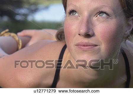 Woman in yoga pose, beside Grayling Lake, Riding Mountain National Park, Manitoba, Canada View Large Photo Image Stock Photo - Woman in yoga pose, beside Grayling Lake, Riding Mountain National Park, Manitoba, Canada. Fotosearch