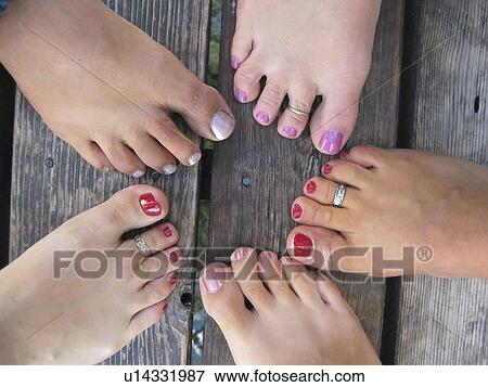 Women's feet with painted toenails, on old wood dock View Large Photo Image Stock Photo - Women's feet with painted toenails, on old wood dock. Fotosearch