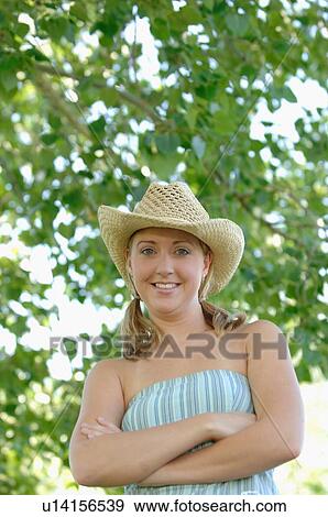 Young blonde female in park with hat, Regina, Saskatchewan View Large Photo Image Stock Photo - Young blonde female in park with hat, Regina, Saskatchewan. Fotosearch