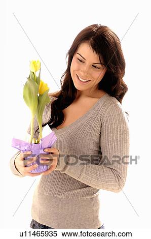 Young girl w/Flower, Regina, Saskatchewan View Large Photo Image Stock Photography - Young girl w/Flower, Regina, Saskatchewan. Fotosearch