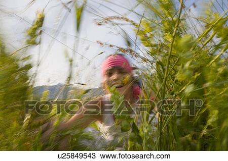 Young woman (19) in alpine meadow, Servoz, Haute Savoie, France View Large Photo Image Stock Image - Young woman (19) in alpine meadow, Servoz, Haute Savoie, France. Fotosearch
