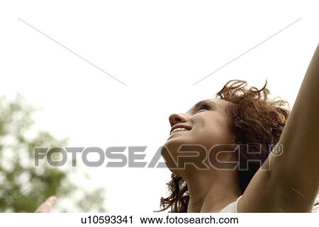 Young woman with face upward, Munson Park, Winnipeg, Canada View Large Photo Image Stock Image - Young woman with face upward, Munson Park, Winnipeg, Canada. Fotosearch