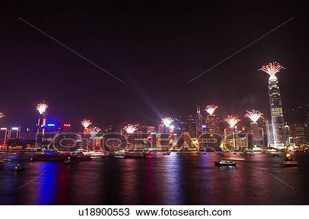 Stock Image - 2007 New Years Eve Fireworks Celebration, Hong Kong, Hong Kong Island skyline at night. Fotosearch