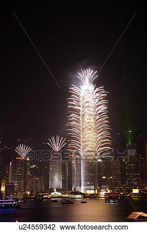 Stock Image - 2007 New Years Eve Fireworks Celebration, Hong Kong, Hong Kong Island skyline at night. Fotosearch