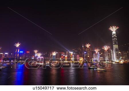 Stock Photo - 2007 New Years Eve Fireworks Celebration, Hong Kong, Hong Kong Island skyline at night. Fotosearch