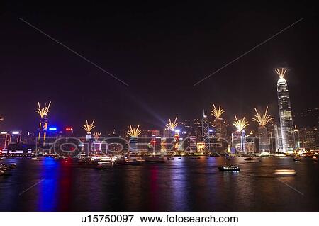 Stock Photo - 2007 New Years Eve Fireworks Celebration, Hong Kong, Hong Kong Island skyline at night. Fotosearch