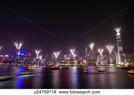 Stock Photo - 2007 New Years Eve Fireworks Celebration, Hong Kong, Hong Kong Island skyline at night. Fotosearch